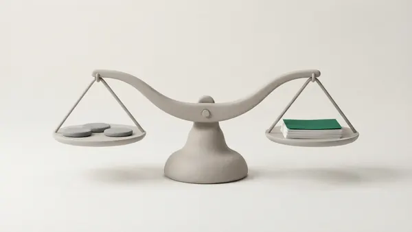 A clay balance scale tipped to the right, three grey discs on the left pan and a stack of paper with a green top sheet on the right